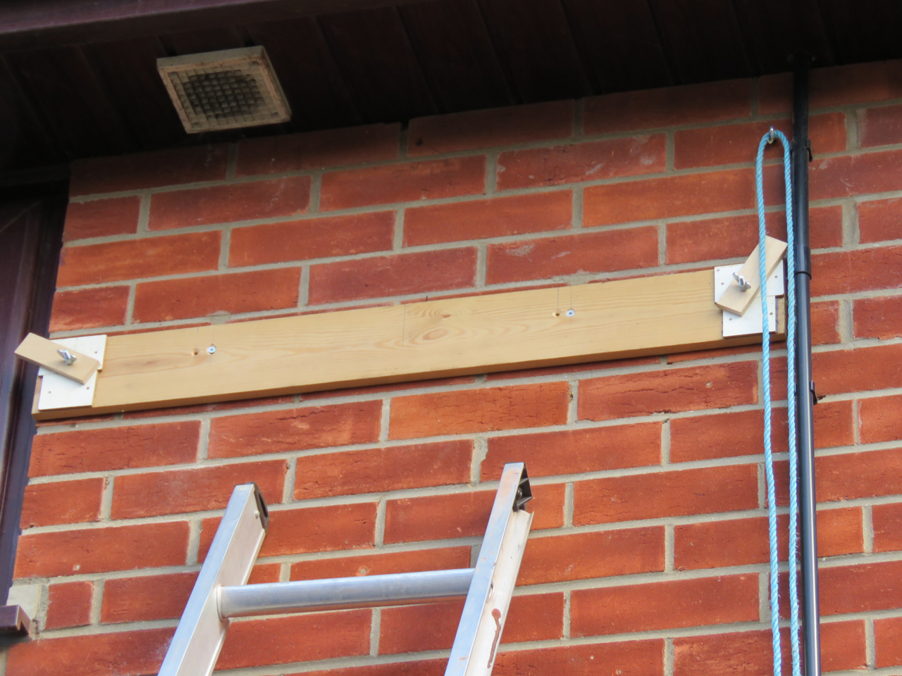 The batten and hoisting roop in place.